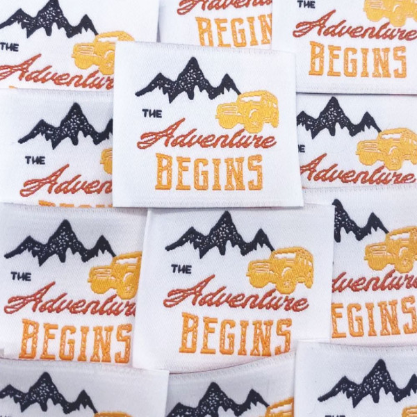 Label "The Adventure begins" 35 x 35 mm