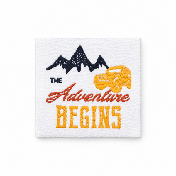 Label "The Adventure begins" 35 x 35 mm
