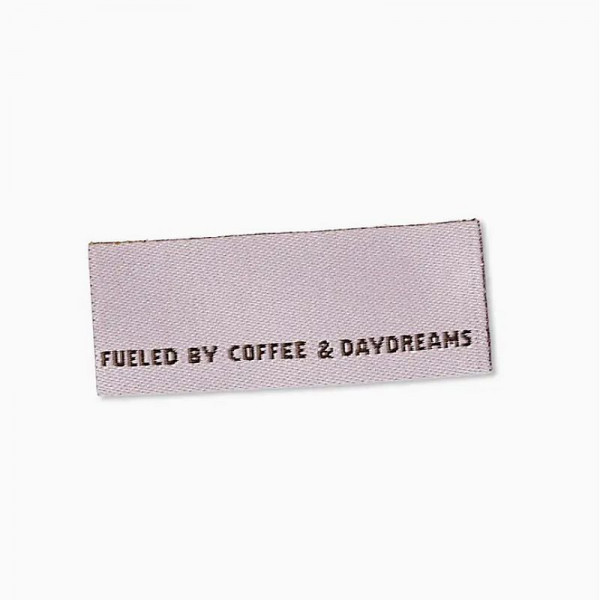 Klapp-Weblabel "Fueled by coffee" 40 x 15 mm