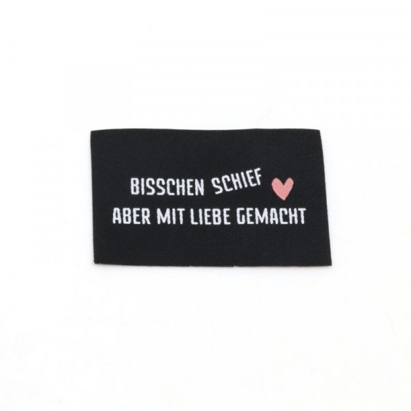 Vævet etiket "Bisschen schief" 57 x 38 mm