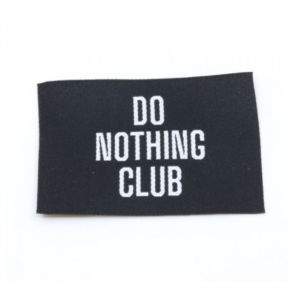 Vævet etiket "Do nothing club" 57 x 38 mm